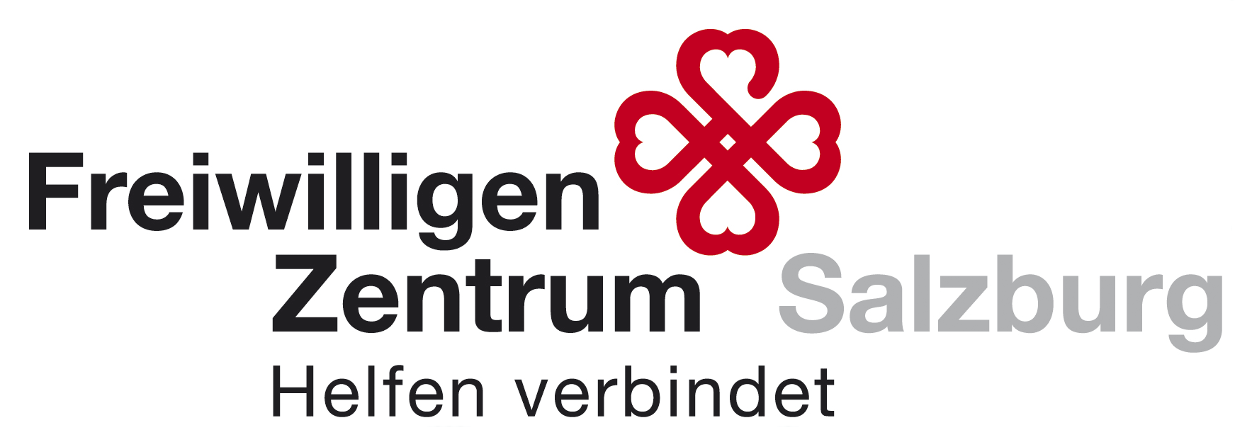 Eine Lehrerin hilft einem Jungen beim Zeichnen in einem Klassenraum, umgeben von Stiften und Materialien. Daniela Klein