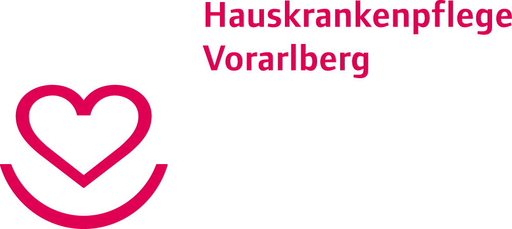 Rotes Herz über einem lächelnden Halbkreis auf weißem Hintergrund. Symbol für Freude und Liebe.