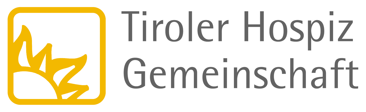 Logo der Tiroler Hospizgemeinschaft mit stilisiertem Sonnenmotiv in Gelb und grauem Schriftzug.