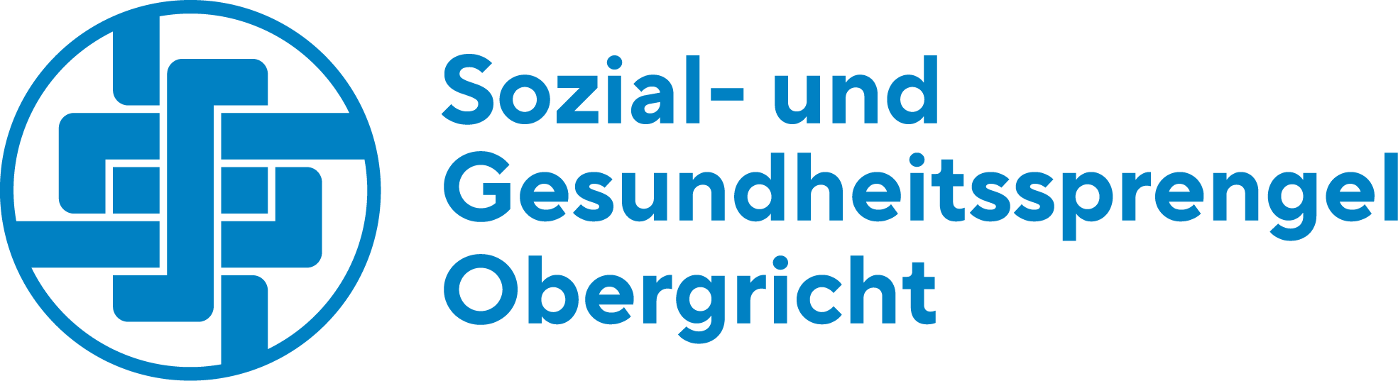Eine Person in Arbeitskleidung justiert die Handbremse eines Rollstuhls in einem Innenraum.